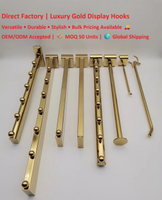 //rkrorwxhopmmli5m.ldycdn.com/cloud/plBpjKkkloSRplnimknnkp/Luxury-gold-metal-display-hooks-for-slatwall-and-retail-store-fixtures-direct-factory-wholesale.jpg